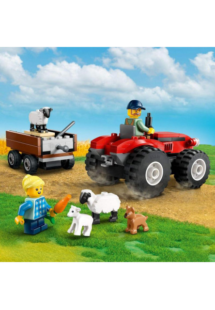 Červený traktor s prívesom a ovcami