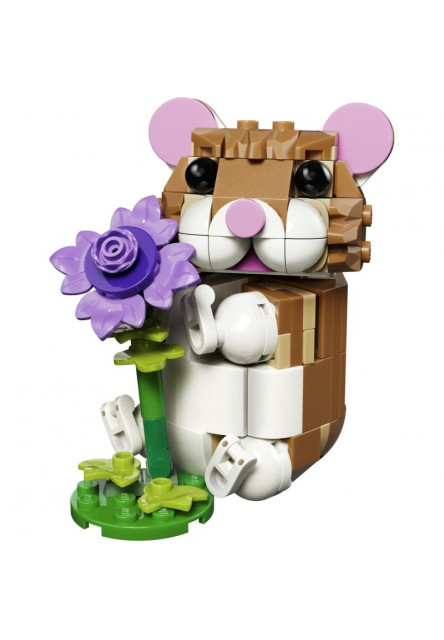 Roztomilý škrečok s kvetinou