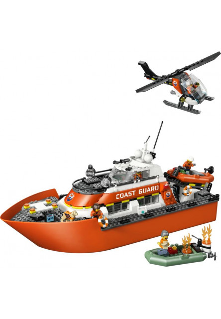 Záchranný čln pobrežnej hliadky a vrtuľník