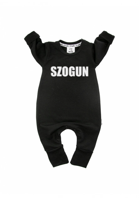 Overal s dlhým rukávom s nápisom 